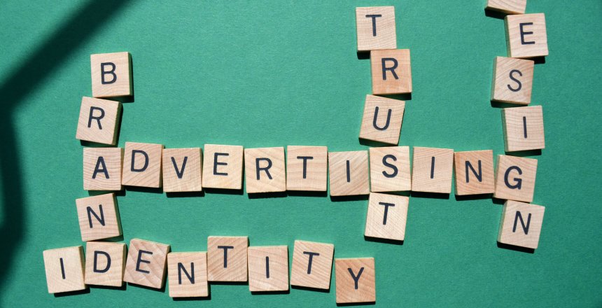 Advertising,,Brand,,Identity,,Trust,,Design,,Crossword,Isolated,On,Green,Background